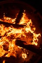 Close up shot of flames in the fire pit at night Royalty Free Stock Photo