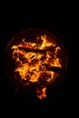 Close up shot of flames in the fire pit at night Royalty Free Stock Photo