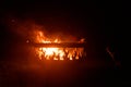 Close up shot of flames in the fire pit at night Royalty Free Stock Photo