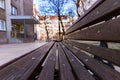 Close up shot of a wooden bench in a residental area in Dorcol, Beograd