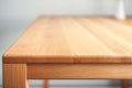 Close up shot of of wooden table top with visible texture. Home interior decoration natural materials