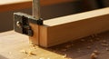 Close-up Shot of Woodworking Process: Precision Clamping of Wooden Blocks during Construction Royalty Free Stock Photo