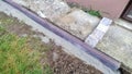 Close-up shot of worker methodically laying paving stones during a renovation. Royalty Free Stock Photo