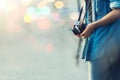 Close-up shot of young woman hand holding a retro film camera. H Royalty Free Stock Photo