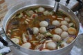 Close-up shots of popular Asian dishes, local dishes, coconut milk curry paste, chicken legs with spicy meatballs, popular dishes