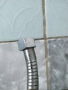 Close up Shower hose. Chrome pipe connection Royalty Free Stock Photo