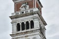 A close up showing details of the top of the bell tower at Saint Mark`s Square, Campanile di San Marco Royalty Free Stock Photo
