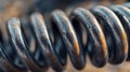 Close up of an Old, Rusty Metal Coil Spring Showing Wear and Tear From Use Royalty Free Stock Photo