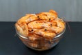 Close-up of shrimp in a glass bowl on a dark stone background. Seafood, healthy food concept. Horizontal photo, macro, selective Royalty Free Stock Photo