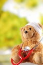 Close up Sick Teddy Bear Toy with Stethoscope Royalty Free Stock Photo