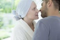 Close-up of sick wife with ovarian cancer looking at her husband Royalty Free Stock Photo