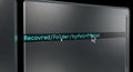Close-up side angle view of a computer monitor screen displaying recovered folder text with white letters on black background and Royalty Free Stock Photo