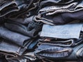 Close up on the side of the blue jeans stack Royalty Free Stock Photo