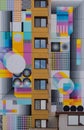 Colorful building with patterns and circles next to the windows as a great mural painting