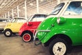 Close Up of Side Details of a Green, Red and Yellow Vintage Car Royalty Free Stock Photo