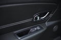 Close-up of the side door buttons: window adjustment buttons, door lock. modern car interior: parts, buttons, knobs Royalty Free Stock Photo