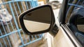 Close up the side mirror of the car, white color Royalty Free Stock Photo