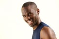 Close up side of handsome young african american man smiling against white background Royalty Free Stock Photo