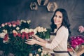 Close up side profile photo beautiful adorable she her lady many roses vases retail seller assistant employee hands arms