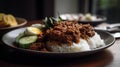 Close-up side view of delicious rendang food on a plate. Beautifully designed and created