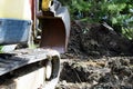 Close up side view of excavator and bucket Royalty Free Stock Photo