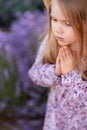 Close up side view. field of lavender. little girl Royalty Free Stock Photo