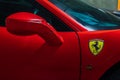 Close-up of Side view mirror and Logo Ferrari Sports Car Royalty Free Stock Photo