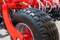 Close up side view photo of fragment huge cleen tire wheel of construction or agriculture auto equipment