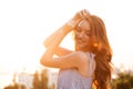 Close up side view of smiling pretty ginger woman Royalty Free Stock Photo