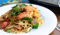 side view spicy spaghetti stirfried seafood thai food, tum yum talay