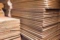 Close-up sides of stacks of cardboard folded