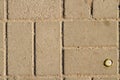 Close-up sidewalk made of cobblestones. Royalty Free Stock Photo