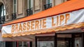 Close-up of the sign on the awning of Brasserie Lipp, Paris, France