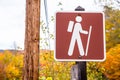 Trailhead sign in the mountains in autumn