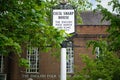 Close-up of the sign of Cecil Sharp House, The English Folk Dance and Song Society