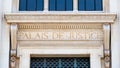 Close-up of the sign on the facade of a French courthouse with the words \