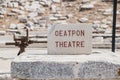 Close up of a sign at the outdoor Ancient Theatre on the Greek island of Delos