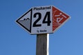 Close-up of a sign on Ty Hoche beach in Plouharnel indicating the sides reserved for swimmers and surfers