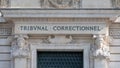 Close-up of the sign written on a facade of the criminal court of Paris, France