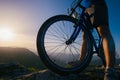 Close up silhouette of an athlete mountain biker riding his bike on rocky mountains Royalty Free Stock Photo