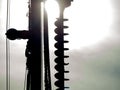 Close-up Silhouette of Excavator hydraulic drilling machine at a Construction site. Royalty Free Stock Photo