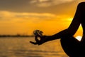 Close up Silhouette hands. Woman do yoga outdoor. Woman exercising vital and meditation for fitness lifestyle club at the sunset b Royalty Free Stock Photo