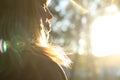 Close-up silhouette of woman looking at sunrise. Mental health, hope, happiness concept. Dream autumn. Peace lifestyle. Open mind