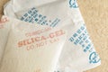 Close up silica gel or desiccant, non-english text translate to Royalty Free Stock Photo