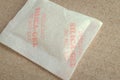Close up silica gel or desiccant in paper bag background