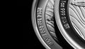 Close up of Silver Bullion Coin on a black mirror background Royalty Free Stock Photo