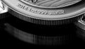 Close up of Silver Bullion Coin on a black mirror background Royalty Free Stock Photo