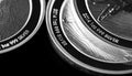 Close up of Silver Bullion Coin on a black mirror background Royalty Free Stock Photo