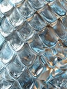 A close up of a silver fish scale pattern Royalty Free Stock Photo