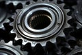 Close up of silver metallic engine gear wheels covered in oil on an industrial background Royalty Free Stock Photo